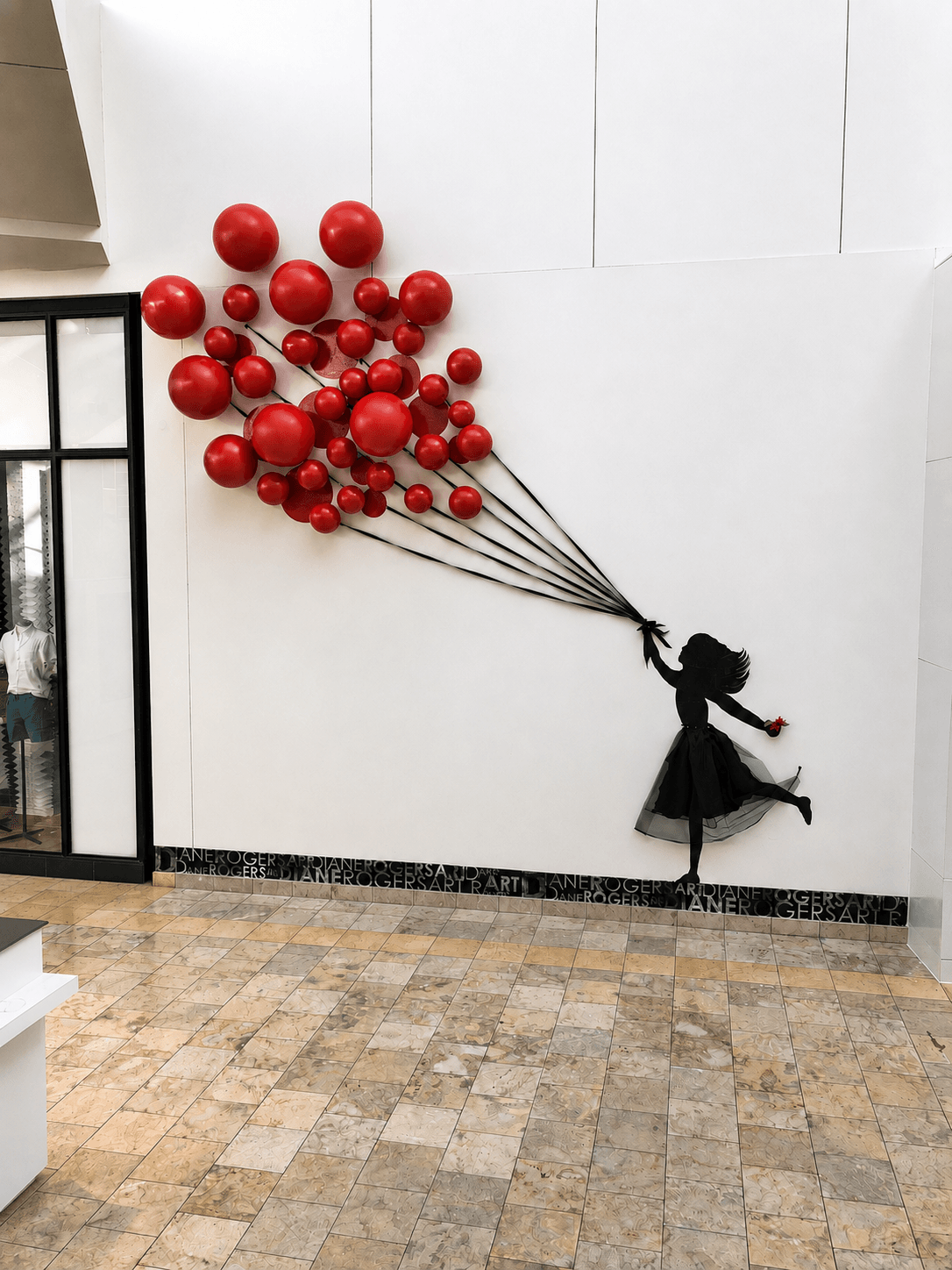 Girl with Balloons installation at Scottsdale Fashion Square
